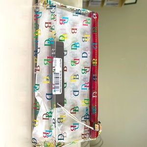 Dooney and Burke clear monogram makeup bag.